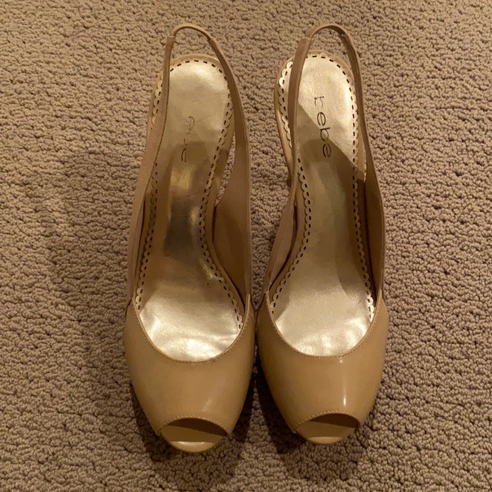 Beautiful tan platform heels in excellent condition and very comfortable.